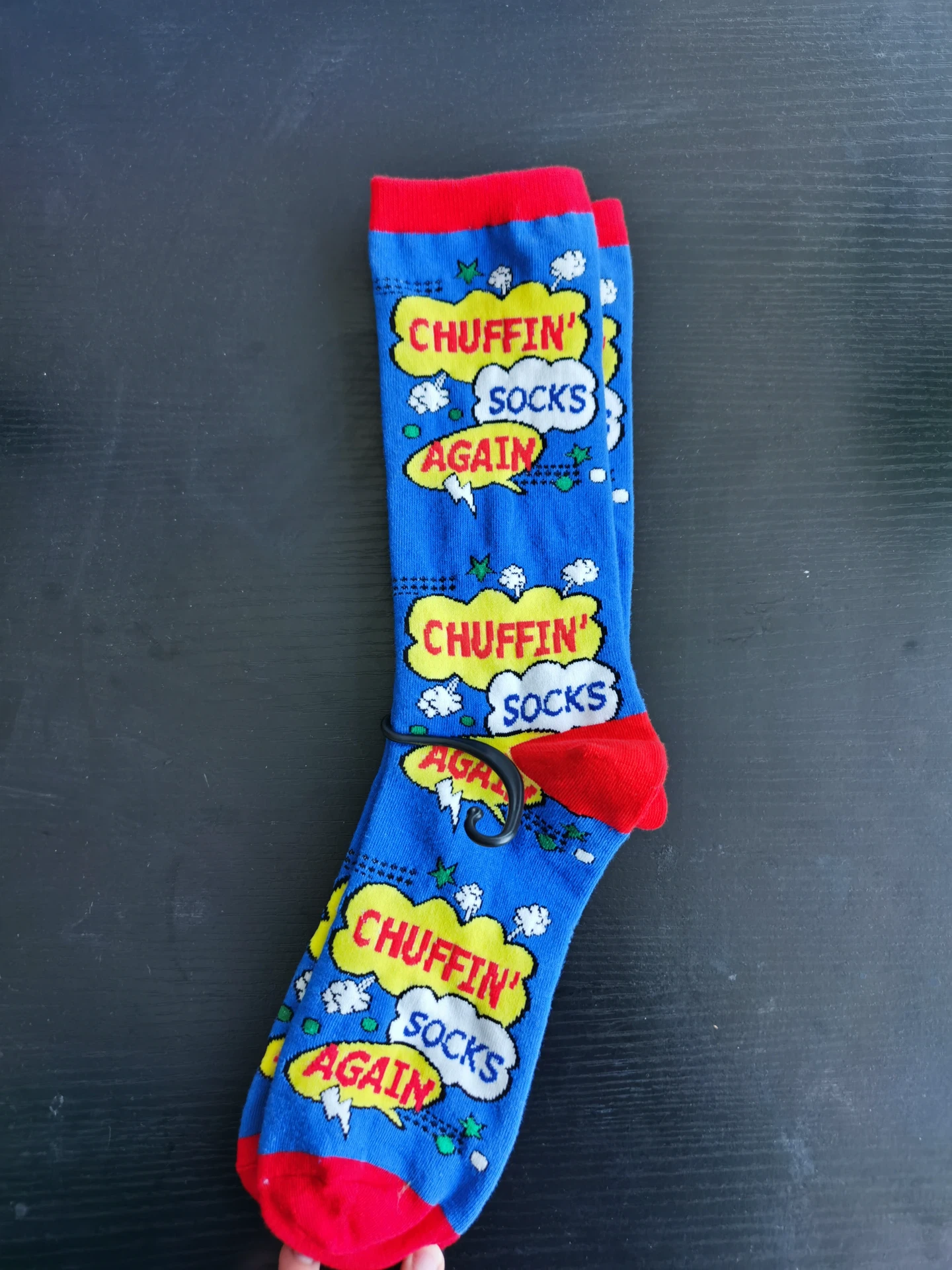 Blue patterned crew socks with cartoon speech bubble design