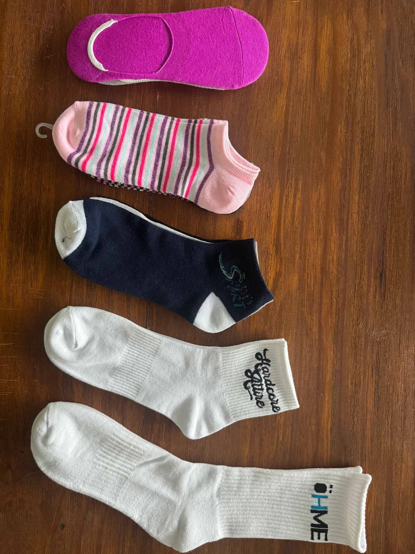Five different sock styles laid flat